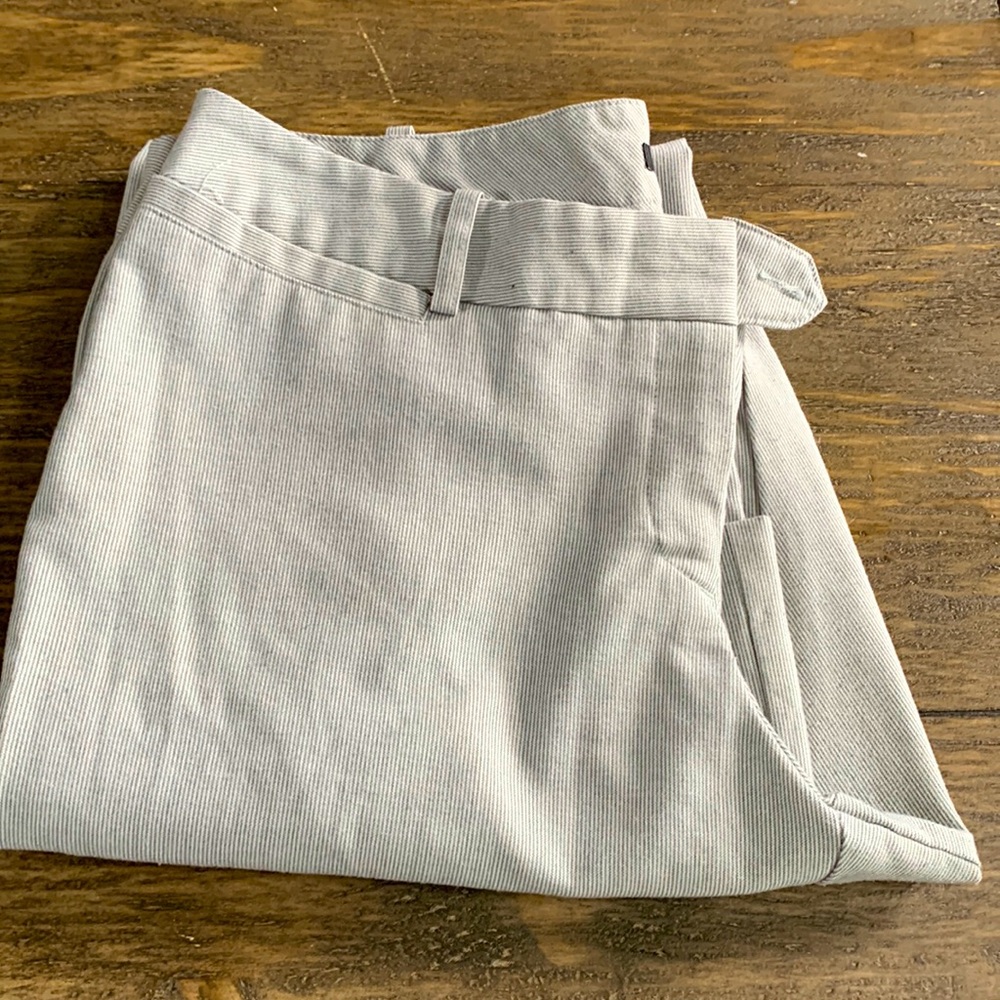 Grey and white dress pants.